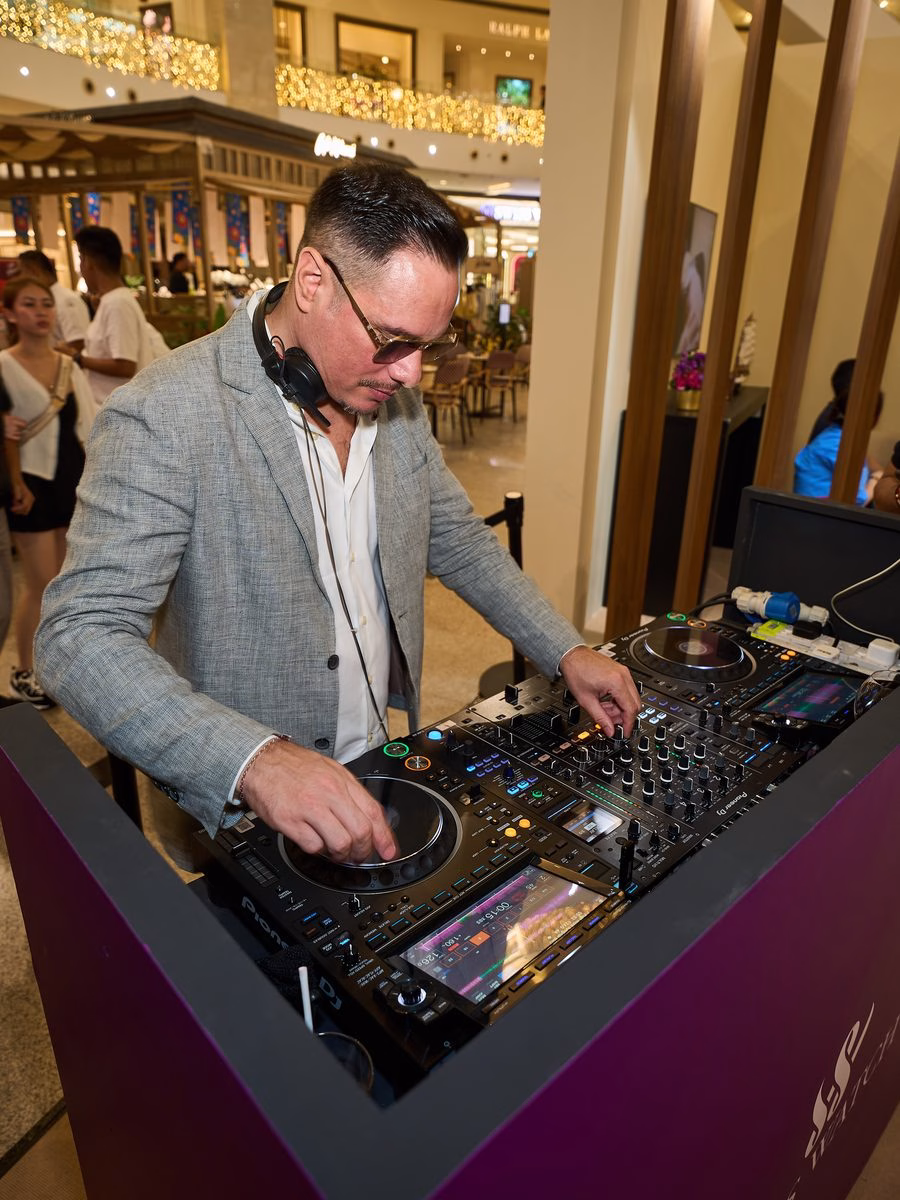 DJ performing at the Art of Time 2026 launch night